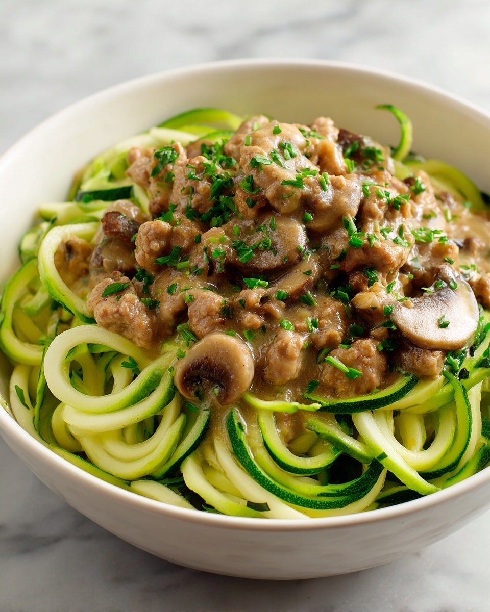 Keto Beef Stroganoff with Creamy Mushroom Sauce and Zucchini Noodles Recipe - Recipe Image — Keto Beef Stroganoff with Creamy Mushroom Sauce and Zucchini Noodles, low-carb beef stroganoff recipe, keto mushroom sauce with zucchini noodles, healthy beef stroganoff, keto comfort food
