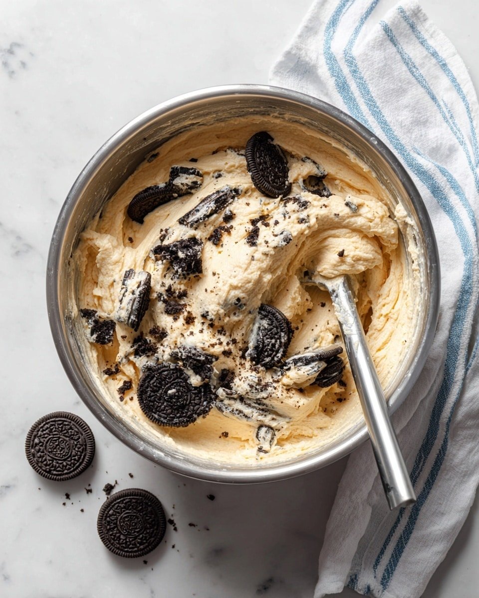 Oreo Cream Cheese Frosting Recipe - Recipe Image — Oreo Cream Cheese Frosting, creamy Oreo frosting, easy Oreo frosting recipe, chocolate chip frosting, decadent cream cheese frosting