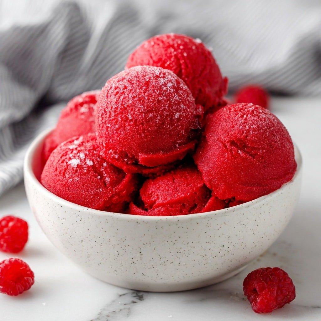 Refreshing Raspberry Sorbet Recipe - Recipe Image — Refreshing Raspberry Sorbet, raspberry sorbet recipe, easy homemade raspberry sorbet, summer fruit sorbet, tart and sweet raspberry dessert
